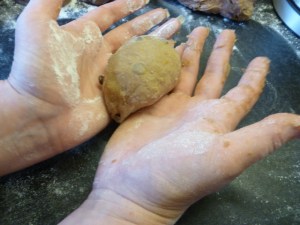 Step Two: Spin the bun, by moving hands in opposite directions