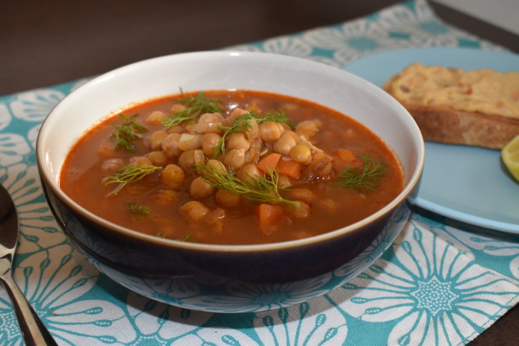 Harissa and Chickpea soup, served with sourdough toast and hummus plus a wedge of lemon for the soup.